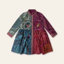 Load image into Gallery viewer, A long-sleeve collared dress with a split design, featuring a green and blue patterned left side and a magenta and orange patterned right side, separated by a patterned border