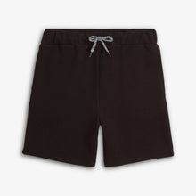 Load image into Gallery viewer, Black shorts with a drawstring on a light gray background
