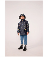 Load image into Gallery viewer, A child wearing a navy blue hooded raincoat with a colorful heart pattern
