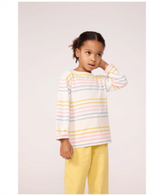 Load image into Gallery viewer, A young girl modeling a white long-sleeve top with pastel yellow, pink, and blue horizontal stripes
