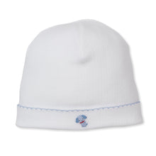 Load image into Gallery viewer, White baby hat with a small puppy  on a white background
