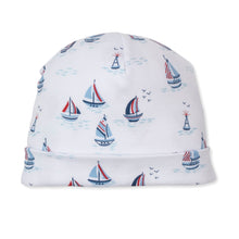 Load image into Gallery viewer, Baby hat with sailboat pattern on a white background
