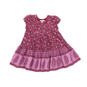 Pink dress with floral pattern on a white background