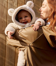 Load image into Gallery viewer, Woman holding a baby in a sherpa bear suit
